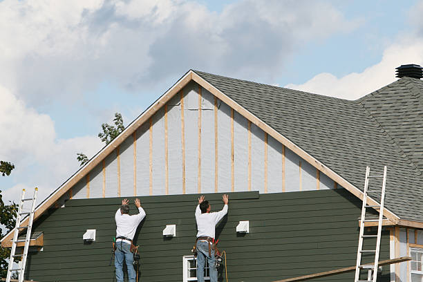 Professional Siding Contractor technician working in Summerfield, NC